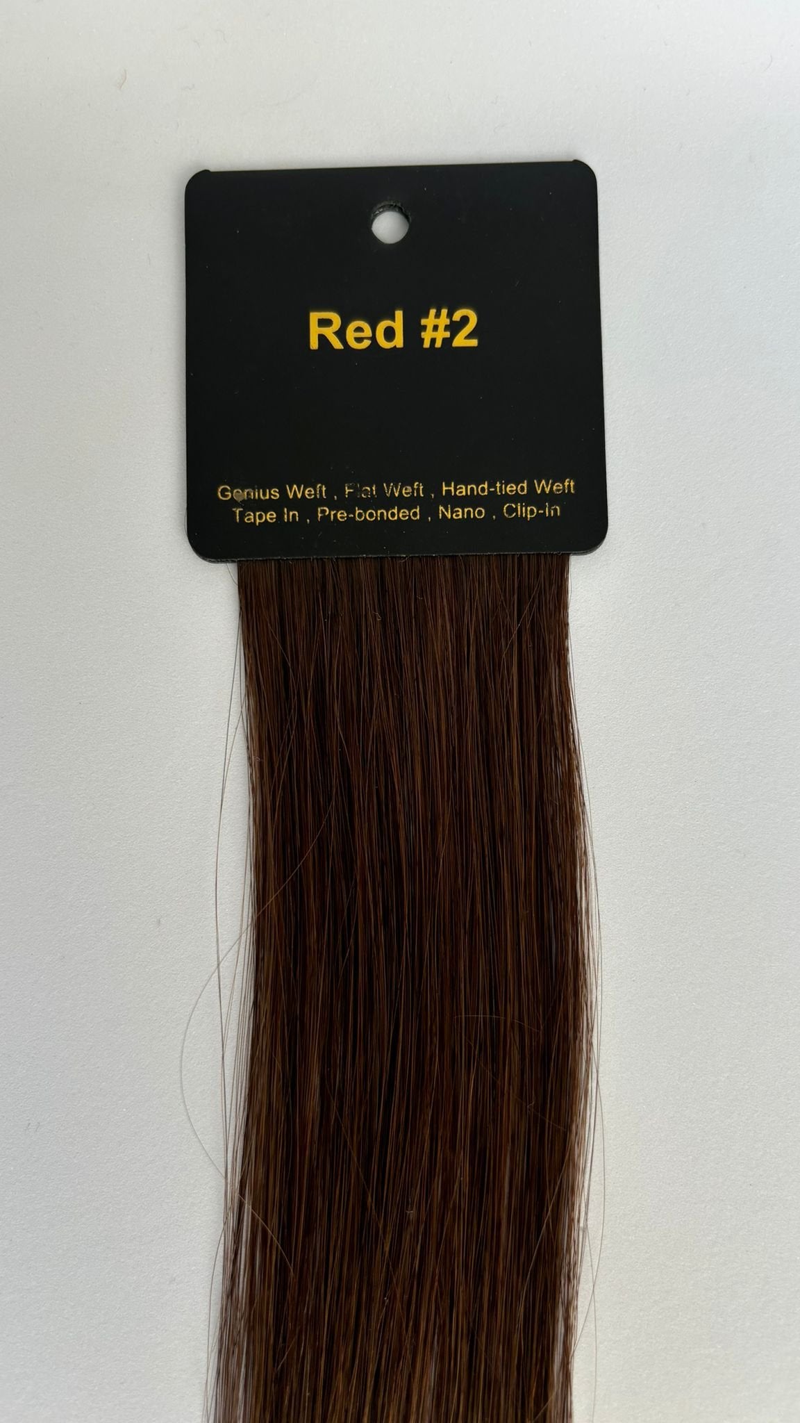 Farveprøve med varm chokoladebrun med rødligt skær